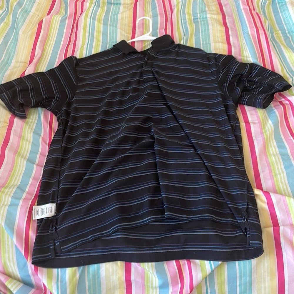 black collared shirt with blue, purple, and white stripes
